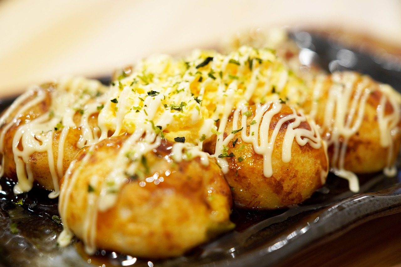 Takoyaki topped with mayonnaise and seaweed