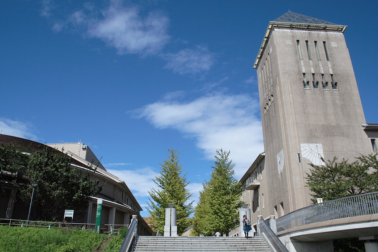 The brick clock tower and ginkgo trees at Tokyo Metropolitan University, Minami-Osawa